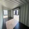 20ft zeecontainer met rolluikdeur - Nieuwe op maat gemaakte opslagcontainer RAL 7035 wit